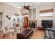 Open floor plan living room with fireplace, neutral walls and a view of the doors to the outdoor at 1051 Dunbar Ave, Sanford, FL 32771