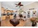 Open floor plan featuring a kitchen that flows into the living room with a fireplace and seating area at 1051 Dunbar Ave, Sanford, FL 32771
