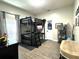 Unique teen bedroom featuring bunk bed with built-in desk and storage at 1226 Deer Lake Cir, Apopka, FL 32712