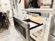 Kitchen features a stainless steel, drawer-style microwave and custom cabinetry at 1226 Deer Lake Cir, Apopka, FL 32712