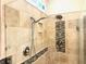 Modern tiled shower stall featuring a rainfall shower head and built-in storage niche at 1226 Deer Lake Cir, Apopka, FL 32712
