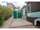 Backyard area with a shed and rainwater collection barrel at 1258 Russell Dr, Ocoee, FL 34761