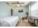 Bedroom featuring a double bed, tile floors, neutral colored walls, and an area rug at 1258 Russell Dr, Ocoee, FL 34761