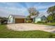 Charming single-story home featuring a two-car garage, and well-maintained landscaping, showcasing curb appeal at 1258 Russell Dr, Ocoee, FL 34761