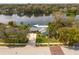 Charming single-Gathering home with well-manicured lawn, private dock, and serene lake views at 1258 Russell Dr, Ocoee, FL 34761