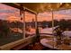 Relax on the patio with string lights while enjoying stunning sunset lake views in this inviting outdoor space at 1258 Russell Dr, Ocoee, FL 34761