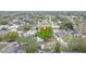An aerial view shows this home in a residential neighborhood with mature trees and manicured lawns at 1259 Vanderbilt Dr, Ormond Beach, FL 32174