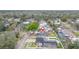 An aerial view shows the surrounding residential neighborhood with mature trees and swimming pools at 1259 Vanderbilt Dr, Ormond Beach, FL 32174