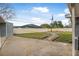 Expansive backyard featuring a stone walkway and privacy fence at 1259 Vanderbilt Dr, Ormond Beach, FL 32174