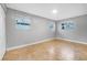 Bedroom features tile floors and two windows at 1259 Vanderbilt Dr, Ormond Beach, FL 32174