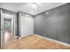 Bedroom features a ceiling fan, tile floors, closet and neutral walls at 1259 Vanderbilt Dr, Ormond Beach, FL 32174