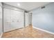 Spacious bedroom with tile floors, neutral paint, large closet, and entry to adjacent room at 1259 Vanderbilt Dr, Ormond Beach, FL 32174