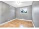 Bedroom with neutral walls, tile floors, ceiling fan and one window at 1259 Vanderbilt Dr, Ormond Beach, FL 32174