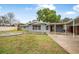Charming single-story home with a spacious yard and covered parking at 1259 Vanderbilt Dr, Ormond Beach, FL 32174