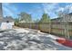 Backyard featuring a concrete pad, privacy fence and simple garden beds for outdoor enjoyment at 129 S Marydell Ave, Deland, FL 32720