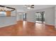 Spacious living room with terracotta tile flooring, sliding glass doors, and easy access to the outdoors at 129 S Marydell Ave, Deland, FL 32720