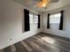 Empty bedroom with hardwood floors and a ceiling fan at 1341 Imperial Dr, Daytona Beach, FL 32117