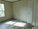 Inviting bedroom featuring new floors and natural light from a window at 1367 Vine St, Daytona Beach, FL 32117