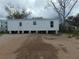 Single story home with white vinyl siding and updated windows at 1367 Vine St, Daytona Beach, FL 32117
