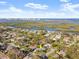 Aerial view of a home showing proximity to the water and the surrounding neighborhood at 1424 Breaks Way, Port Orange, FL 32127