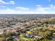 An aerial view of a home situated within a neighborhood, surrounded by lush greenery at 1424 Breaks Way, Port Orange, FL 32127