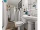 This bathroom offers a shower, a toilet, a vanity sink, and decorative touches, creating a functional space at 1424 Breaks Way, Port Orange, FL 32127