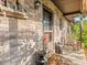 Charming front porch with brick accents, decorative milk jugs and nautical decor at 1424 Breaks Way, Port Orange, FL 32127