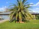 Lush front yard with mature landscaping, providing great curb appeal and a welcoming entrance at 1424 Breaks Way, Port Orange, FL 32127