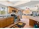 Bright kitchen featuring stainless appliances, bar, and tiled floors at 1424 Breaks Way, Port Orange, FL 32127