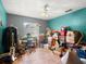 This room is filled with belongings and features a window providing natural light at 1424 Breaks Way, Port Orange, FL 32127