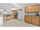 Well-equipped kitchen featuring modern appliances, ample counter space, and wood cabinetry at 1702 Carolina Ave, Ormond Beach, FL 32174