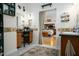 Classic bathroom vanity with tile and a peek into the main bedroom at 1773 Blue Oak Ct, Deland, FL 32720