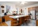 Charming kitchen with a center island, updated appliances, and ample counter space at 1773 Blue Oak Ct, Deland, FL 32720