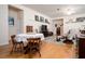Cozy living room featuring hardwood floors, crown molding, and comfortable seating at 1773 Blue Oak Ct, Deland, FL 32720