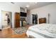 Relaxing main bedroom with a view of an open closet and en-suite at 1773 Blue Oak Ct, Deland, FL 32720