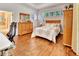 Bedroom with a work space, hardwood floors, and stylish stained glass window at 1875 Glenwood Oaks Ln, Deland, FL 32720