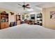 Spacious bonus room, featuring a workspace and custom bookcases at 1875 Glenwood Oaks Ln, Deland, FL 32720