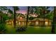Charming one-story home with well-maintained lawn, beautiful shrubbery, and mature trees at 1875 Glenwood Oaks Ln, Deland, FL 32720