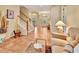 Spacious foyer with tile flooring, staircase, and a welcoming atmosphere at 1875 Glenwood Oaks Ln, Deland, FL 32720