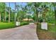 Beautiful single-story home with mature trees along an expansive driveway at 1875 Glenwood Oaks Ln, Deland, FL 32720