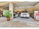 Two-car garage with both doors open showcases clean organization and bright lighting at 1875 Glenwood Oaks Ln, Deland, FL 32720