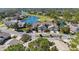 The aerial view shows the neighborhood, golf course, and serene ponds enhance community appeal at 2015 Cornell Pl, Port Orange, FL 32128