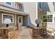 A quaint front entrance of a townhome with brick accents and a small garden at 2015 Cornell Pl, Port Orange, FL 32128