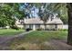 A lush backyard, creating a serene outdoor space perfect for relaxation and entertaining at 238 Crooked Tree Trl, Deland, FL 32724