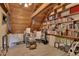 Attic office with wood floors, built-in bookshelves, and lots of natural light at 238 Crooked Tree Trl, Deland, FL 32724