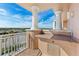 Inviting balcony with stunning neighborhood and partial ocean views, perfect for outdoor relaxation at 2515 S Atlantic Ave # 401, Daytona Beach Shores, FL 32118