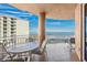Expansive balcony with ocean views and outdoor dining area at 2515 S Atlantic Ave # 401, Daytona Beach Shores, FL 32118