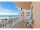 Relax on this spacious balcony offering ocean views, tiled floors, and comfortable seating at 2515 S Atlantic Ave # 401, Daytona Beach Shores, FL 32118
