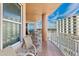 Enjoy outdoor seating on the spacious tiled balcony with views of the city at 2515 S Atlantic Ave # 401, Daytona Beach Shores, FL 32118