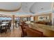 Stylish bar area with granite countertops and seating overlooking ocean views at 2515 S Atlantic Ave # 401, Daytona Beach Shores, FL 32118